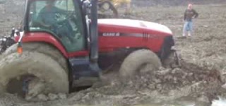 Tractor Gets Stuck In the Mud and Rescues Itself Splendidly