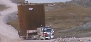Unbelievably Hard Transportation: Hydraulic Axle Truck Carries 80,000Lbs Steel Tank Over the Hill