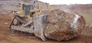 Insane Bulldozer Caterpillar D11R Pushes a Gigantic Rock With Its Breathtaking Power